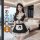 Woman modeling qqny pure allure sleepwear set — elegant black lace lingerie with apron, bow details, and sheer trim in luxury...