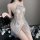 Elegant sensual sequined sleepwear set featuring halter neck design and fringe details, perfect for luxury bedroom wear.