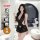Woman modeling qqny pure allure black lace sleepwear set in modern bedroom, featuring silky fabric and elegant sensual design...
