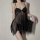 Elegant black sheer sleepwear set featuring lace detailing and delicate fabric, perfect for luxurious intimate nightwear.