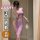 Woman modeling purple lace qqny pure allure sleepwear set — elegant, sensual lingerie with sheer panels and feather accessory...