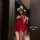 Woman in red christmas lingerie set with bunny ears, posing seductively in mirror. pure & tempting sexy sleepwear, naughty un...
