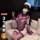 Woman in purple lace qqny seductive lounge set with blindfold and maid headpiece, luxury sensual nightwear for pure desire.