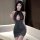 Woman wearing qqny seductive maid costume lingerie set – tempting forbidden-style sleepwear with lace and glittery skirt.