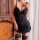 Woman wearing qqny sensual lingerie sleepwear set with lace bralette and matching robe, featuring elegant black design and ga...