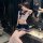 A stylish model showcases the qqny sexy lingerie set, featuring a pure and tempting soft girl jk uniform with a short skirt d...