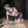 A woman poses on a rug wearing a qqny sexy lingerie set, featuring a pure and tempting soft girl jk uniform short skirt outfi...
