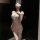 Woman wearing qqny silk-lace seductive lingerie set – a sheer, pink, cheongsam-inspired sleepwear with lace blindfold and pla...