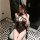 Woman wearing qqny vintage lace sheer open-crotch chemise with bunny ears, seated in stylish room—romantic chinese-inspired l...