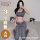 Woman modeling qqny womens lingerie set - pure allure sleepwear, featuring a sleek gray crop top and matching high-waisted le...