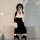 Rabbit girl costume set featuring plush bunny ears, fluffy tail, and black dress with stockings for cosplay and role play.
