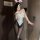 Sexy rabbit-themed costume set featuring a sparkling bodysuit, fluffy headband, and feathered accessories perfect for parties...
