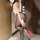 Sexy rabbit-themed costume set featuring a white bodysuit with fluffy details, black stockings, and red high heels perfect fo...
