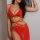 Sexy red rabbit girl costume with gold sequins, perfect for bedroom play and roleplay.