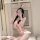 Woman in pink rabbit girl lingerie set with bunny ears, posing seductively for role play or passionate nights.