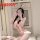 Woman in pink floral rabbit girl lingerie set with bunny ears, posing seductively for role play or passionate nights.