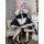 Two cosplayers dressed as ram and rem from re:zero, wearing maid outfits in lolita style. black and white dresses with ruffle...