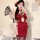 Woman wearing red chinese-style floral lingerie robe with vintage peony embroidery, halter neck, and lace cutouts.