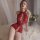 Red lace bodysuit featuring open crotch design and sheer bust, perfect for sexy new year lingerie sets.