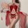 Woman modeling red lace hanfu-style doudou sleepwear with tassels, sheer sleeves, and adjustable ties.