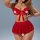 Woman modeling red lace lingerie set with ruffle trim, featuring matching bra and panty.