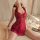 Woman wearing red lace cheongsam-inspired sleepwear on bed, showcasing sheer one-piece design with elegant cutouts and delica...