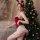 Red velvet bunny costume for women - seductive lace backless bodysuit with ties & cutouts, featuring festive design and elega...