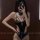 Sexy black lace bunny girl outfit with feather collar, perfect for christmas and new year celebrations.