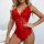 Woman wearing red lace deep v-neck sheer bodysuit, elegant lingerie for intimate moments.