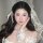 Elegant bridal hairstyle featuring a retro lace bow veil headband, perfect for french chic weddings and photoshoots.