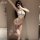 Luxury romantic lace bodysuit for women - silky ice silk strapless sensual open-crotch one-piece set, showcased by a confiden...