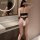 Luxury romantic lace bodysuit for women - silky ice silk strapless sensual open-crotch one-piece set, showcased on a model wi...