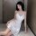 Elegant white satin nightgown with delicate lace detailing, perfect for romantic sleepwear and seductive evening outfits.