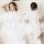 A woman poses elegantly in a romantic new year bride lingerie set, featuring a sexy transparent wedding nightwear ensemble an...