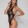 Woman wearing black lace bodysuit with rose pattern, featuring cut-out sides and halter neck design.
