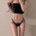 Ruiyun lace thong panties featuring sheer cut-out design, crisscross ties, and bow detail for sexy allure.