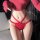 Sexy red lace thong for women featuring low-rise design, cross-cut style with bow detail, perfect for pure temptation.