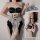 Sexy maid costume set for women featuring black and white design, open-crotch style, sweet and alluring lingerie.