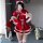 A person wearing a festive santa-themed outfit, featuring a red and white dress with fur trimmings, gloves, stockings, and re...