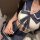 Sexy sailor uniform cosplay set featuring a revealing top with a sailor-style collar and bow tie, paired with a matching skir...
