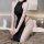Seductive black backless cheongsam sleepwear featuring side slit and open-crotch design, perfect for women seeking elegant ni...