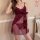 Woman wearing burgundy lace sheer chemise with built-in pads, featuring a bow detail and matching panties — modest yet sexy s...