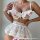 Woman wearing white lace sheer babydoll nightgown with push-up bra and ruffled skirt, posing seductively.
