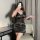 Woman wearing sheer black lace sleep dress, elegant lingerie for date night, no-remove design.