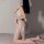 Seductive lace sleepwear set featuring sheer bodysuit with tied straps, pure temptation design.