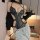 Woman wearing black pvc bodysuit with zipper front, cutouts, and tether rope; seductive leather bondage bodysuit for women – ...