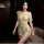 Woman wearing sheer floral-embroidered seductive maid costume lingerie set, elegant sleepwear with short sleeves and side sli...