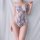 Sheer floral lace bodysuit with blue embroidery and pink flowers, featuring adjustable straps and side ties for a seductive y...