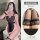Seductive maid costume with pink accents, black lace stockings, and playful charm for women.