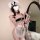 Seductive nighttime lingerie set featuring busty & petite friendly maid costume with bunny ears and thigh highs.